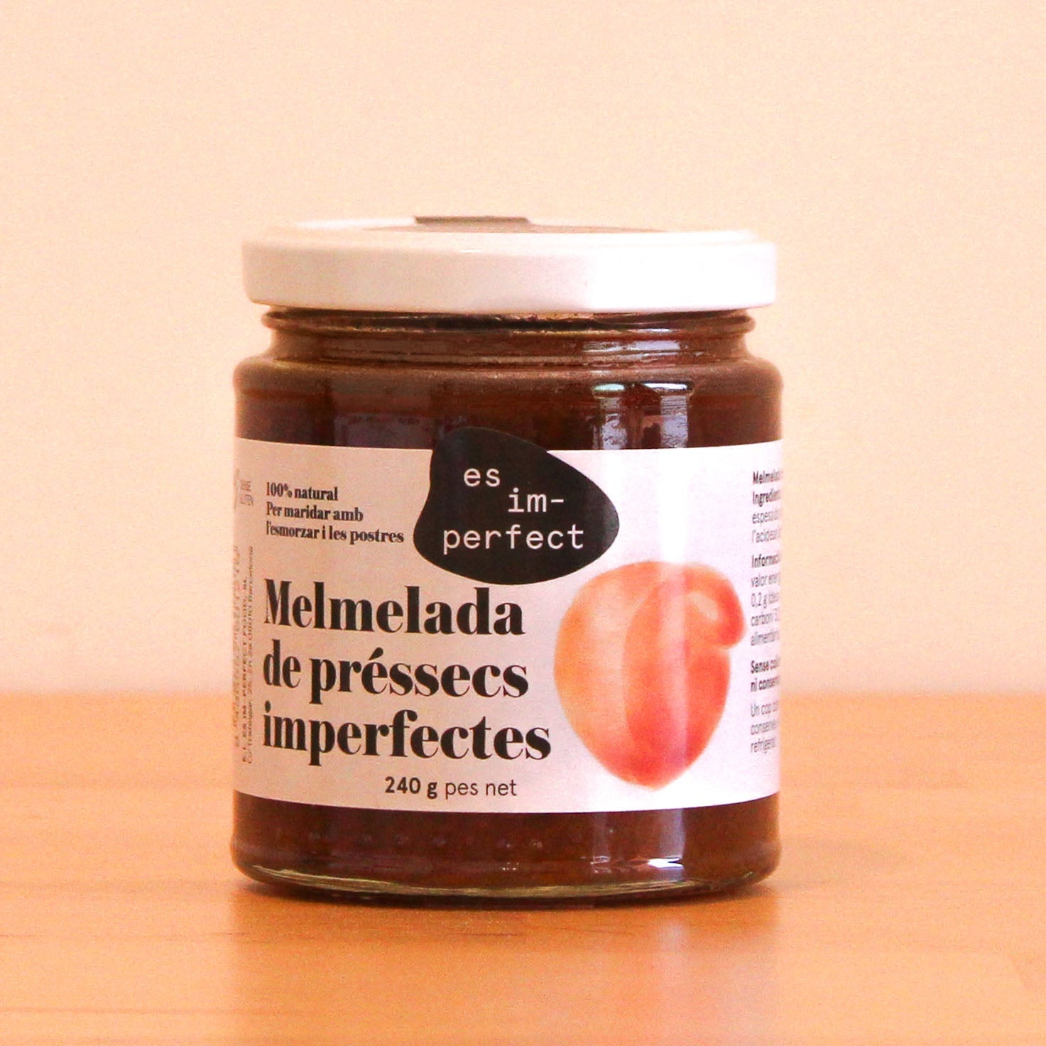 Mermelada de melocotón, tarro de la marca es im-perfect.